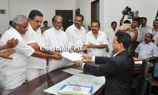 Poojary files nomination, says it's a straight fight between Cong and BJP in DK