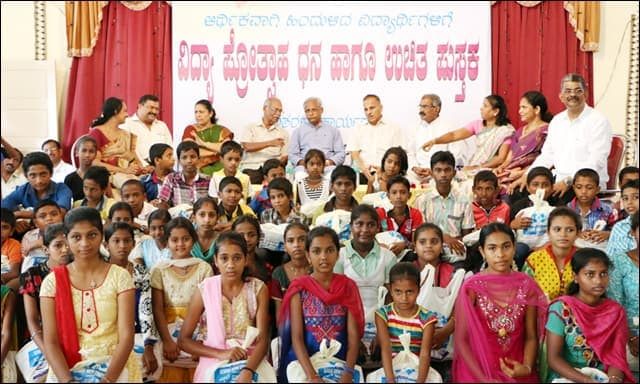 Kundar family donates school books and scholarships to 150 students
